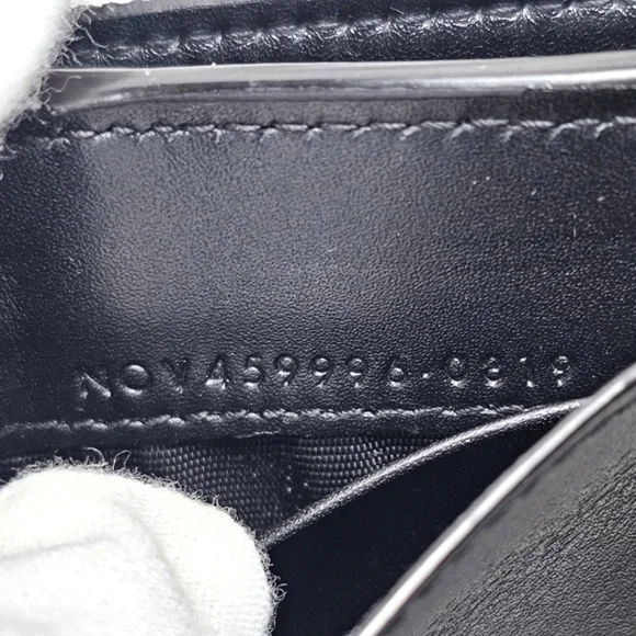 Beautiful wallet only damaged in the coin pocket can see the rest